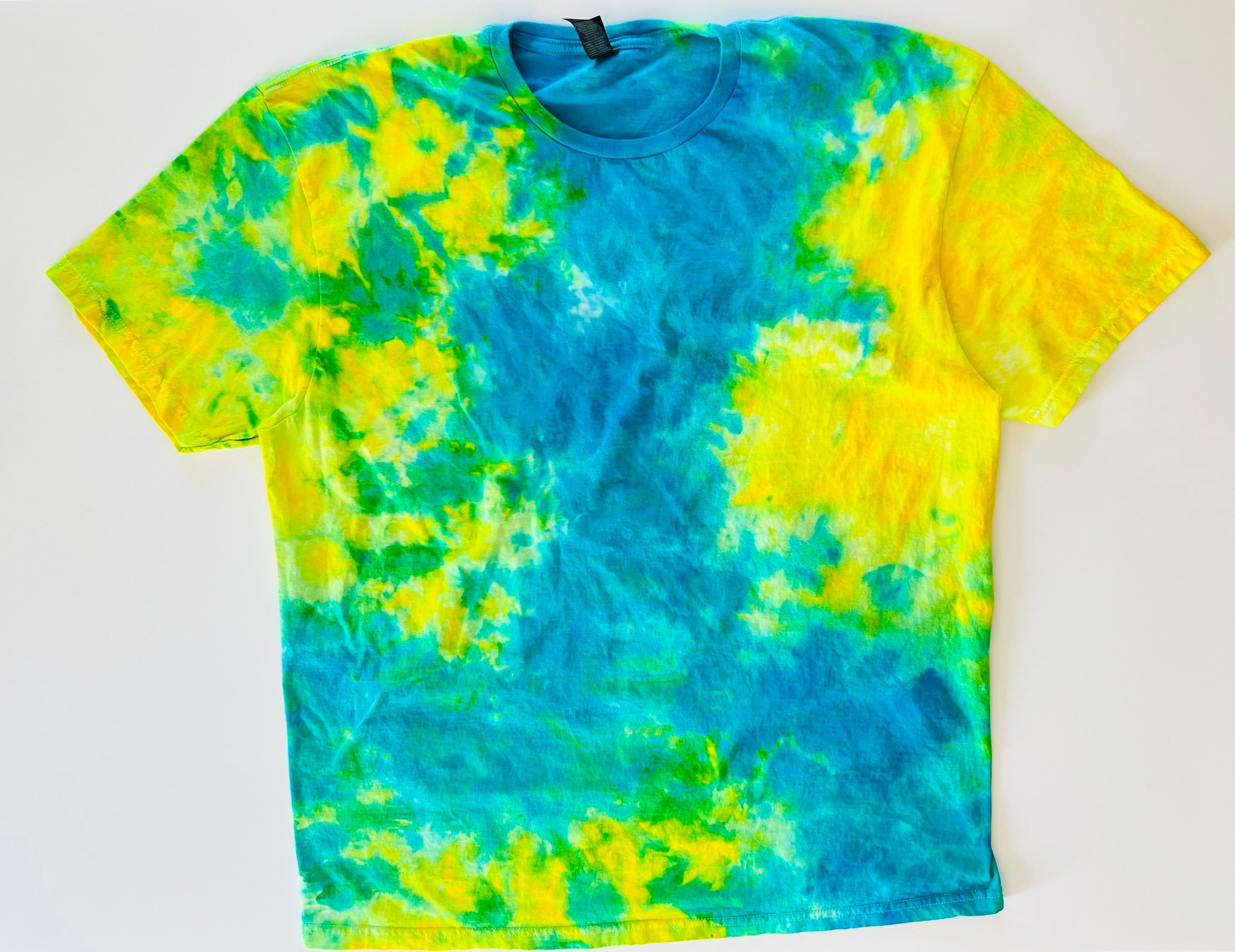 Trendy tie-dye shirts in vibrant colors that add a splash of fun to your wardrobe Cozy and stylish tie-dye hoodies perfect for staying warm and fashionable Unique tie-dye crewnecks with eye-catching patterns for a chic, casual look Handmade tie-dye apparel for a one-of-a-kind addition to your collection Comfortable and fashionable tie-dye hoodies and crewnecks for everyday wear