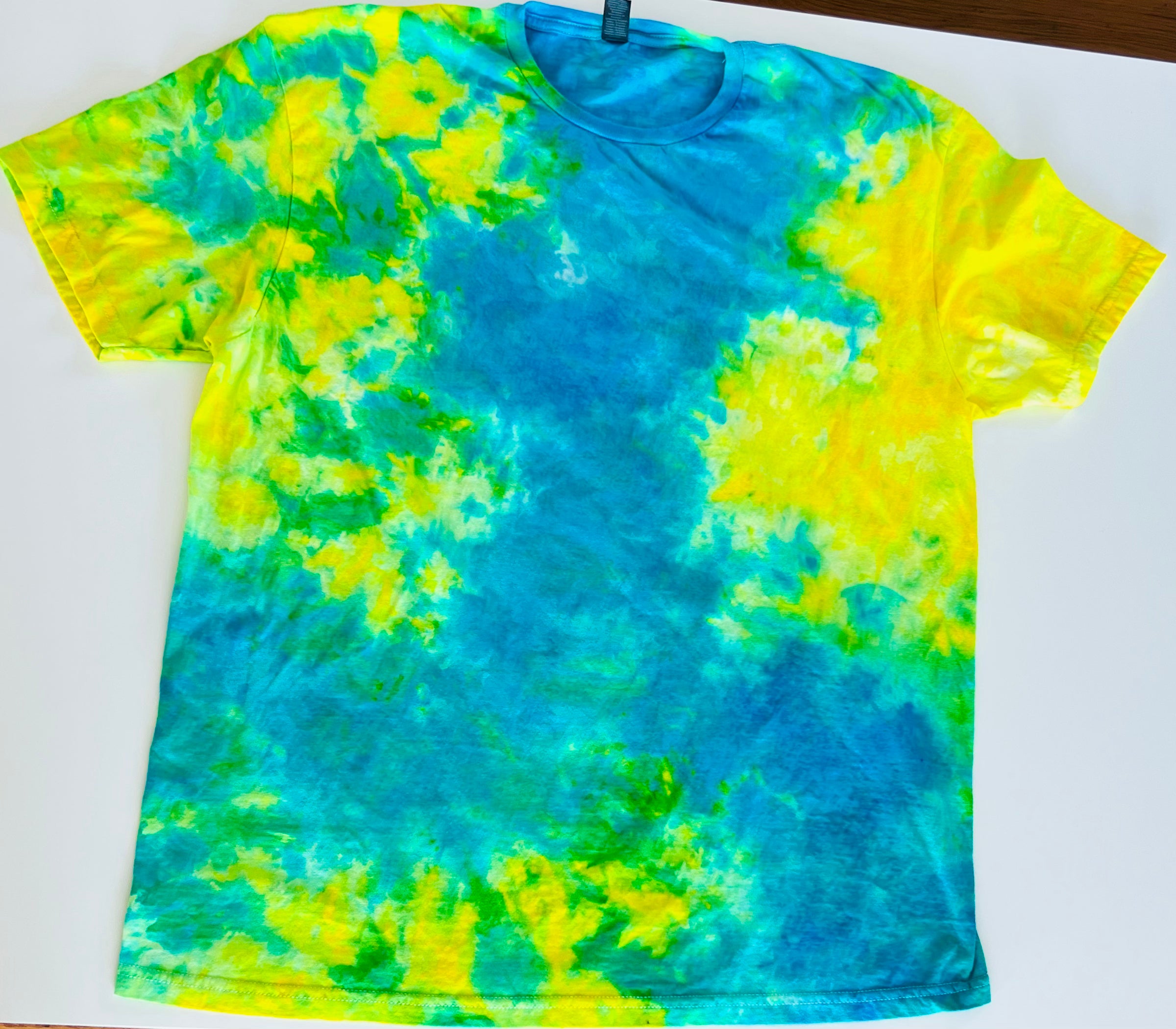 Trendy tie-dye shirts in vibrant colors that add a splash of fun to your wardrobe Cozy and stylish tie-dye hoodies perfect for staying warm and fashionable Unique tie-dye crewnecks with eye-catching patterns for a chic, casual look Handmade tie-dye apparel for a one-of-a-kind addition to your collection Comfortable and fashionable tie-dye hoodies and crewnecks for everyday wear