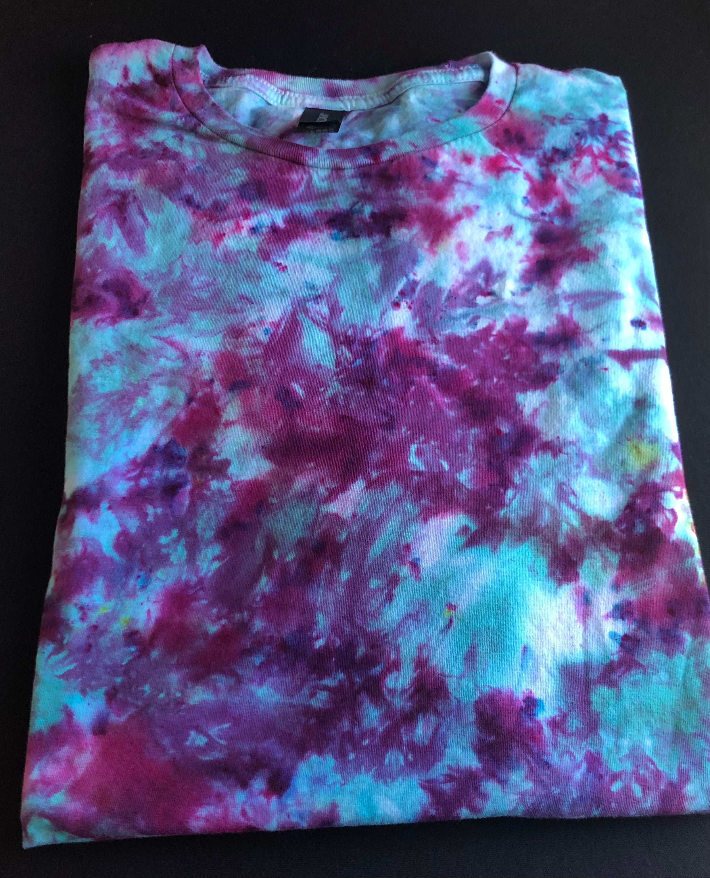 Trendy tie-dye shirts in vibrant colors that add a splash of fun to your wardrobe Cozy and stylish tie-dye hoodies perfect for staying warm and fashionable Unique tie-dye crewnecks with eye-catching patterns for a chic, casual look Handmade tie-dye apparel for a one-of-a-kind addition to your collection Comfortable and fashionable tie-dye hoodies and crewnecks for everyday wear 