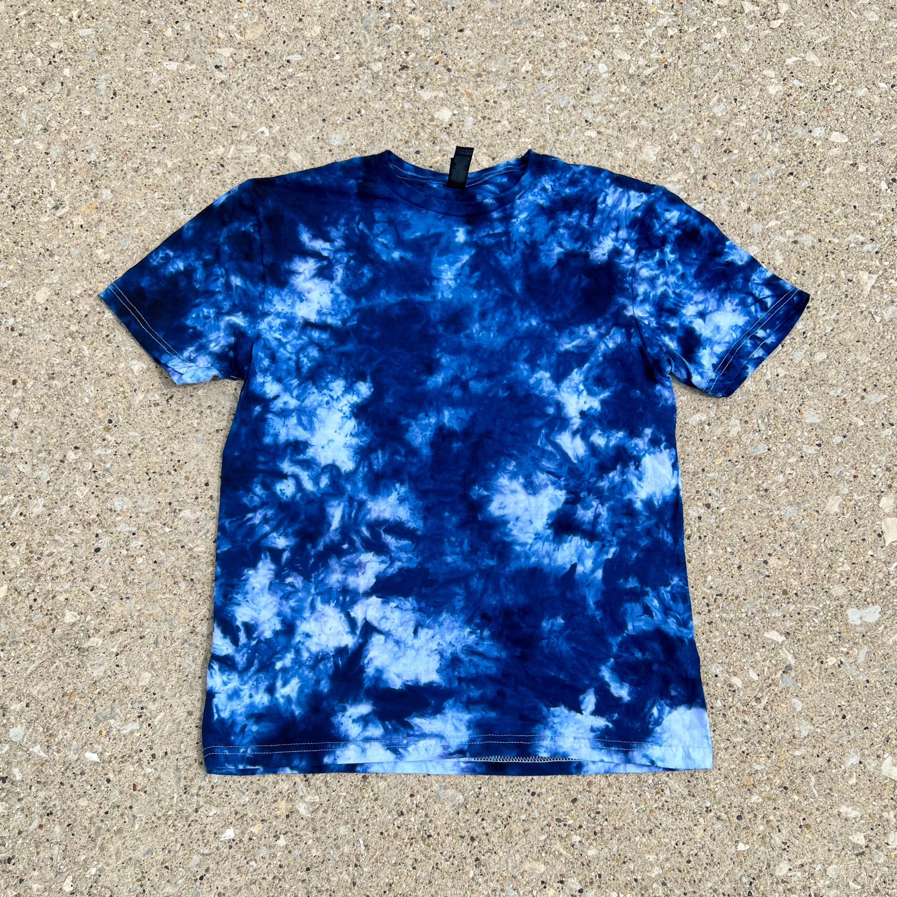 Trendy tie-dye shirts in vibrant colors that add a splash of fun to your wardrobe Cozy and stylish tie-dye hoodies perfect for staying warm and fashionable Unique tie-dye crewnecks with eye-catching patterns for a chic, casual look Handmade tie-dye apparel for a one-of-a-kind addition to your collection Comfortable and fashionable tie-dye hoodies and crewnecks for everyday wear