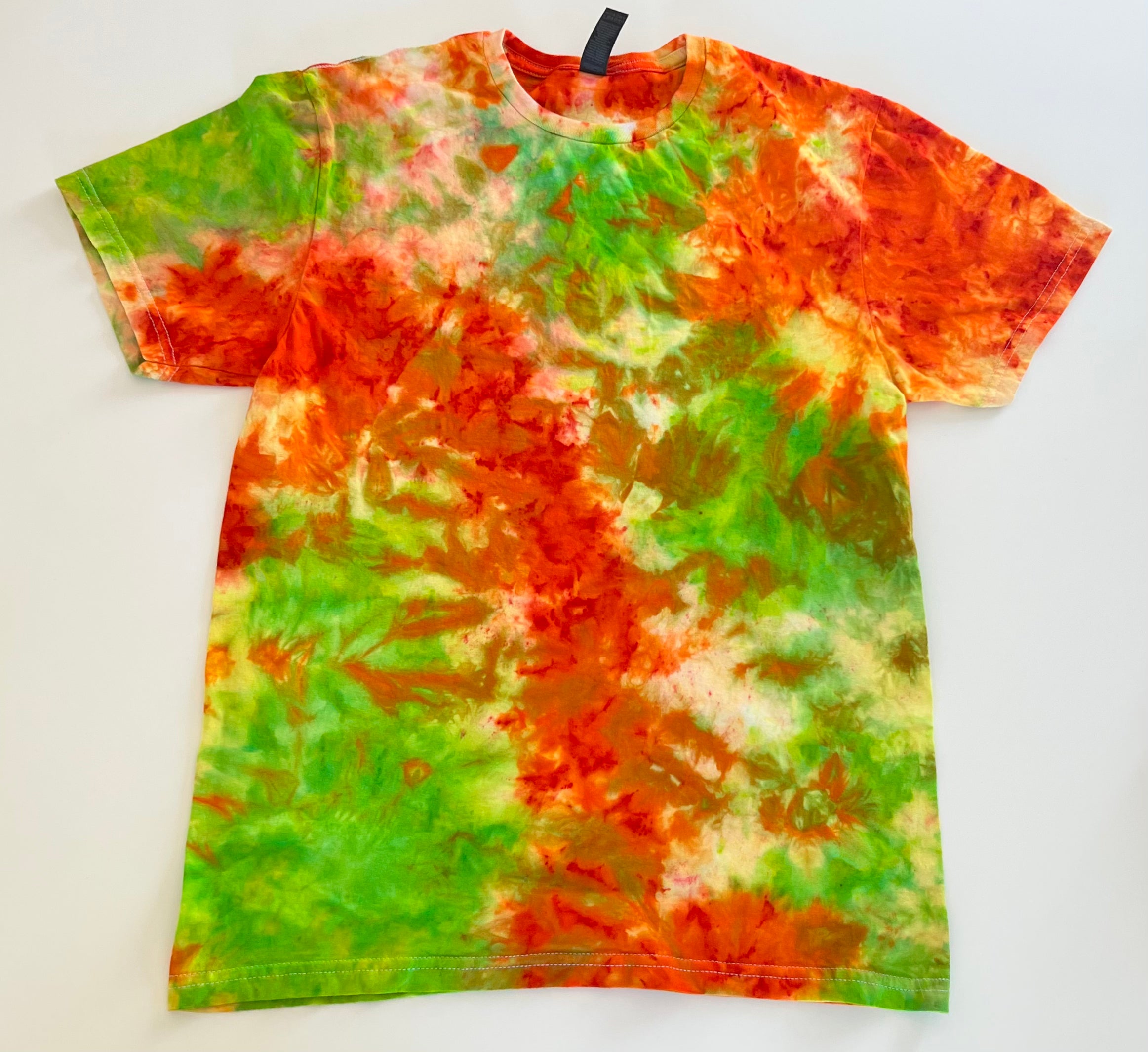 Trendy tie-dye shirts in vibrant colors that add a splash of fun to your wardrobe Cozy and stylish tie-dye hoodies perfect for staying warm and fashionable Unique tie-dye crewnecks with eye-catching patterns for a chic, casual look Handmade tie-dye apparel for a one-of-a-kind addition to your collection Comfortable and fashionable tie-dye hoodies and crewnecks for everyday wear