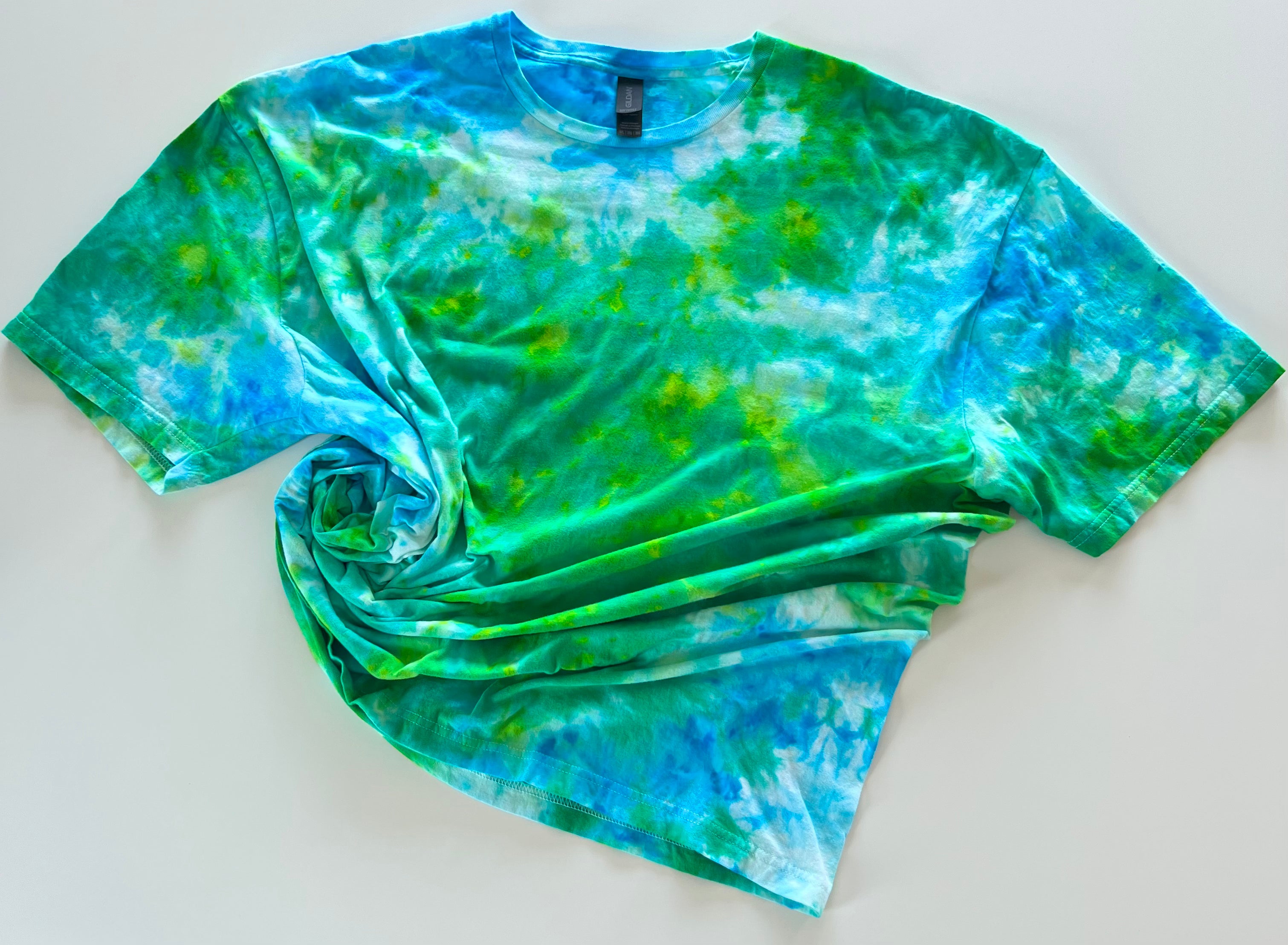Trendy tie-dye shirts in vibrant colors that add a splash of fun to your wardrobe Cozy and stylish tie-dye hoodies perfect for staying warm and fashionable Unique tie-dye crewnecks with eye-catching patterns for a chic, casual look Handmade tie-dye apparel for a one-of-a-kind addition to your collection Comfortable and fashionable tie-dye hoodies and crewnecks for everyday wear