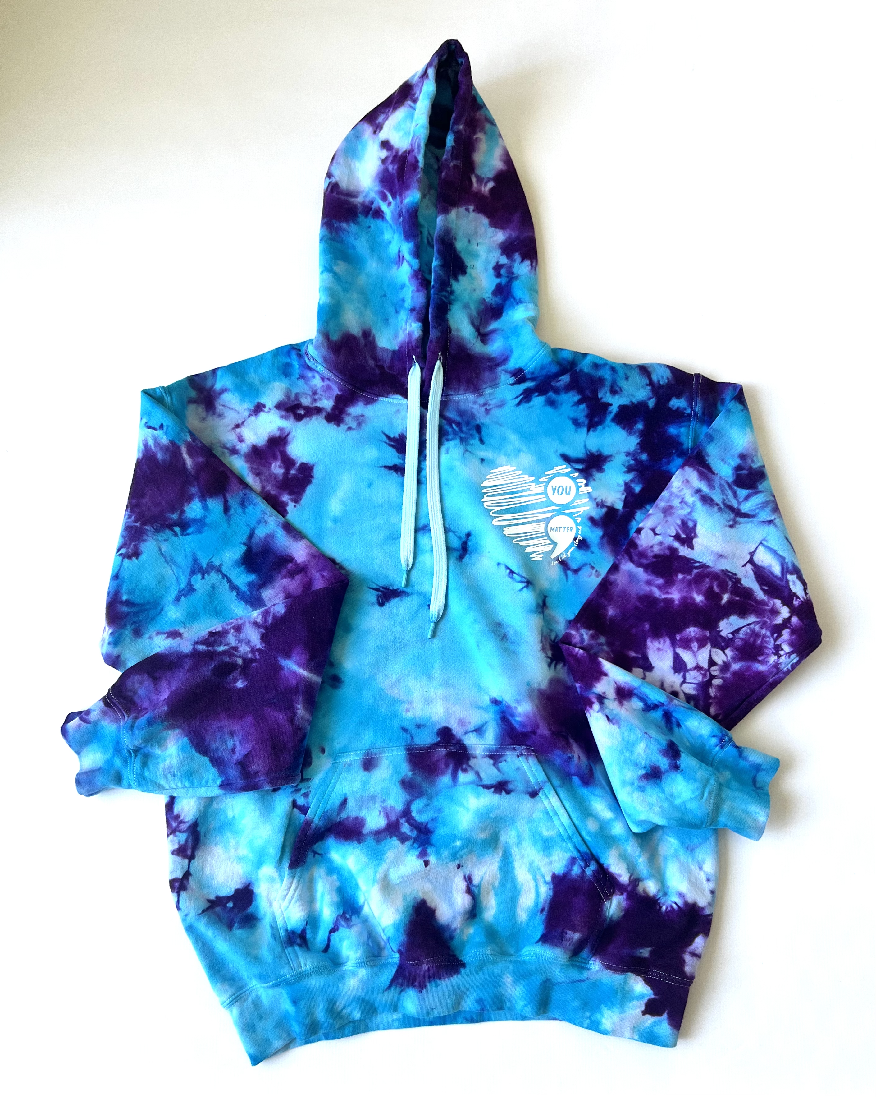 Trendy tie-dye shirts in vibrant colors that add a splash of fun to your wardrobe Cozy and stylish tie-dye hoodies perfect for staying warm and fashionable Unique tie-dye crewnecks with eye-catching patterns for a chic, casual look Handmade tie-dye apparel for a one-of-a-kind addition to your collection Comfortable and fashionable tie-dye hoodies and crewnecks for everyday wear