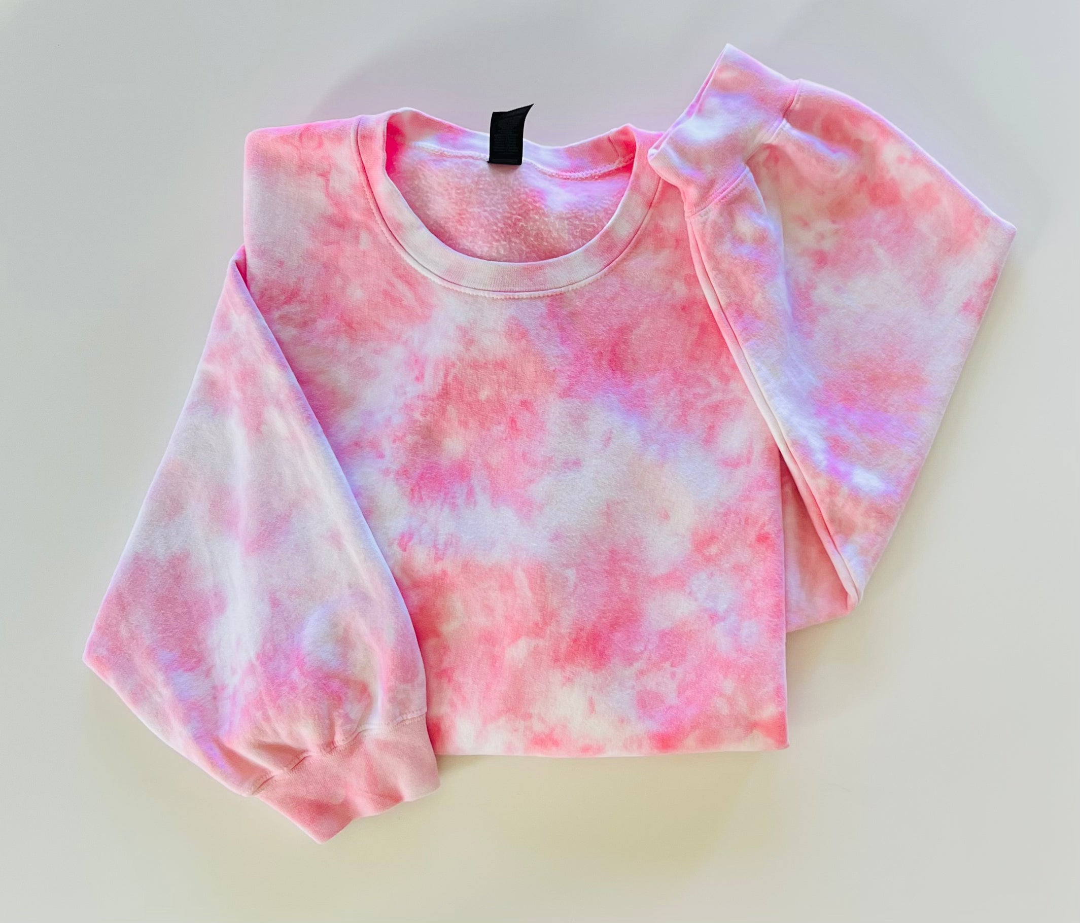 Trendy tie-dye shirts in vibrant colors that add a splash of fun to your wardrobe Cozy and stylish tie-dye hoodies perfect for staying warm and fashionable Unique tie-dye crewnecks with eye-catching patterns for a chic, casual look Handmade tie-dye apparel for a one-of-a-kind addition to your collection Comfortable and fashionable tie-dye hoodies and crewnecks for everyday wear mental health positivity self care self love calm after storm pastel pink